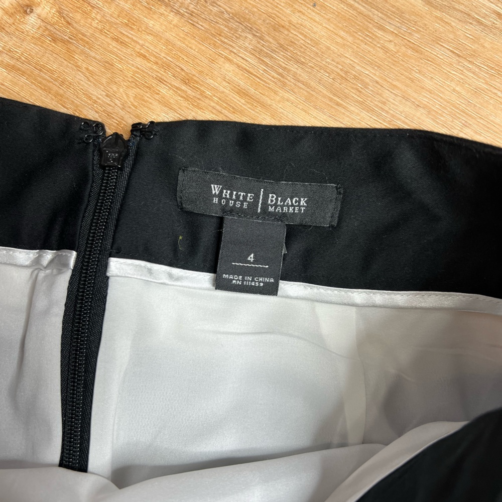 White House Black Market skirt. Tiered black, white, tan. Size 4. Zip back. - Picture 6 of 7